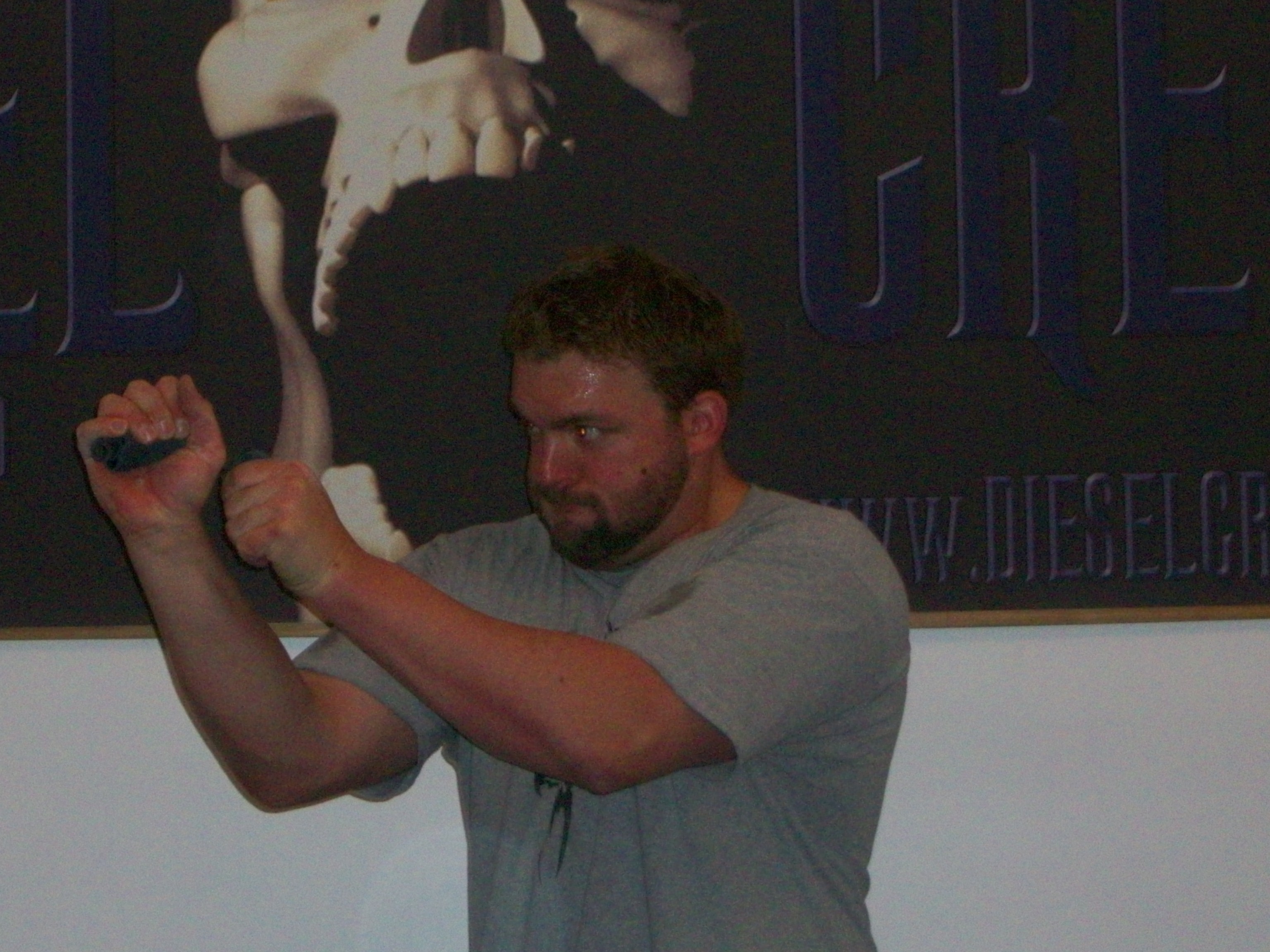 Man doing exercise of reverse bending.