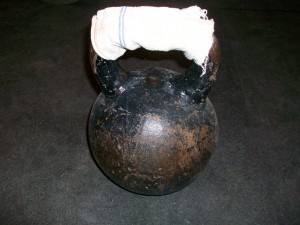 Thin Towel Tightly Wrapped Around a Kettlebell Handle