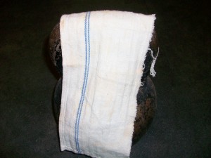 towel draped over kettlebell handle